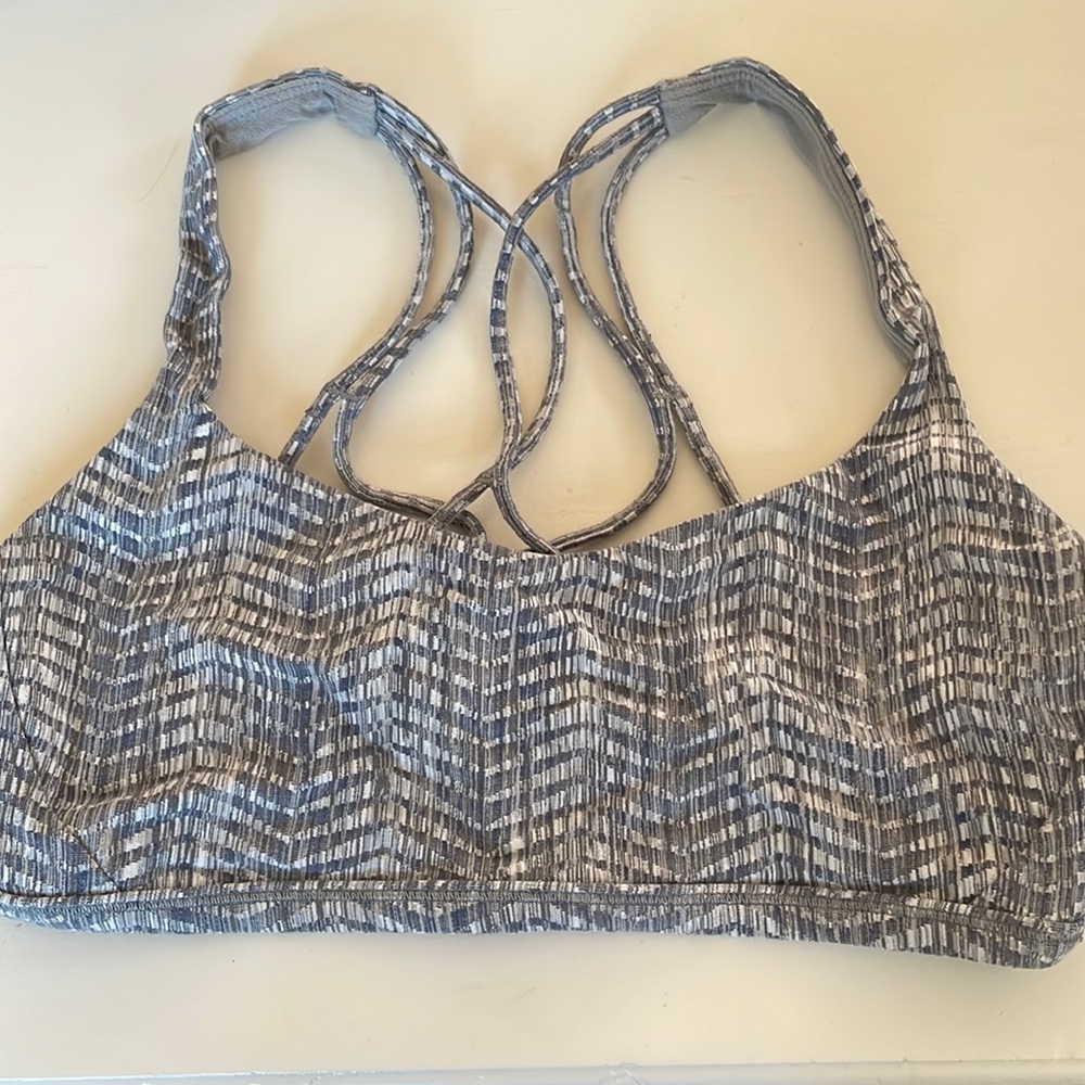 Gray patterned Lulu lemon sports bra with strappy cross back